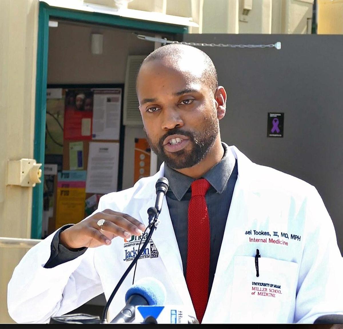 Dr. Hansel Tookes speaks during a news conference at the Idea Exchange on Thursday, April 27, 2017, where he announced that University of Miami Idea Exchange will begin distributing naloxone, or Narcan, at a needle exchange program in Overtown, the center of Miami’s opioid epidemic.
