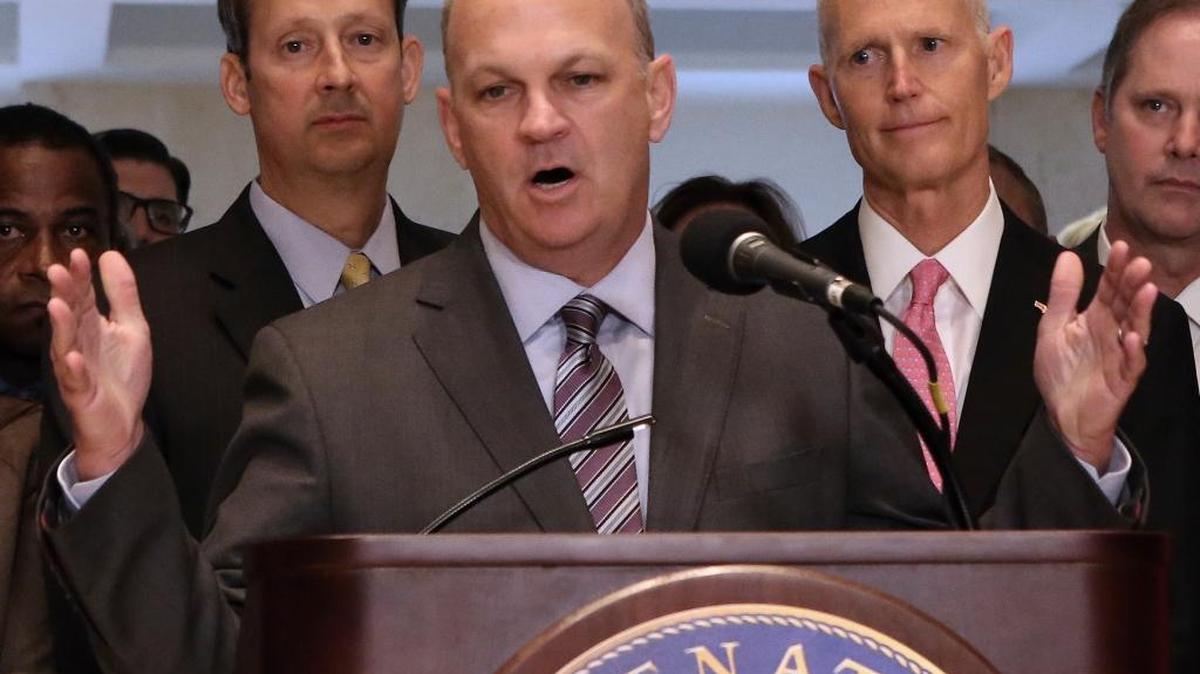 House Speaker Richard Corcoran, R-Land O’Lakes, addresses legislators and media at the end of the special session as Senate President Joe Negron, R-Stuart, left, and Gov. Rick Scott look on, Friday, June 9, 2017, in Tallahassee.