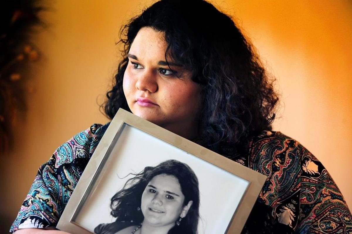 Haylee Kalick holds a photo of herself when she was 14-years-old and life was a little easier. Haylee, 21, is diagnosed with Tourette Syndrome, bipolar disorder, obsessive compulsive disorder and attention deficit hyperactivity disorder. But she has not been committed to a hospital psychiatric ward in more than two years since she signed up for Medicaid, which pays for her prescription medications, which can cost about $1,500 a month, and psychological counseling. Her father, Bruce Kalick, is worried that Medicaid cuts proposed in Congress would send his daughter spiraling back to instability.