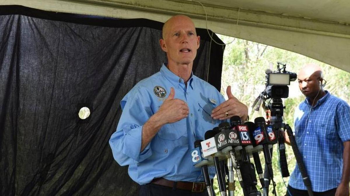 Gov. Rick Scott gives a short speech and answers questions during a press conference following his Sept. 27 visit to Mosaic Co.’s New Wales facility, where a sinkhole released 215 million gallons of acidic water into the Floridan Aquifer.