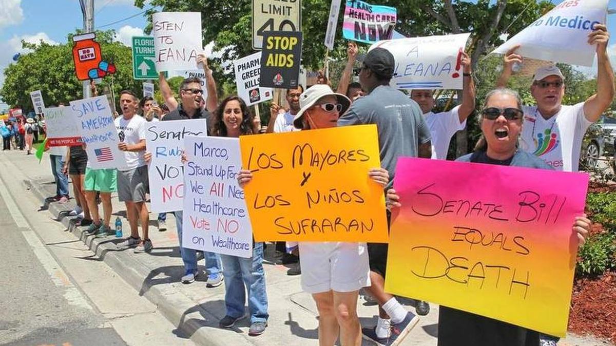 Pro-Obamacare activists demonstrated outside Sen. Marco Rubio's Doral office Monday to urge him to oppose the Senate's "Better Care Reconciliation Act."