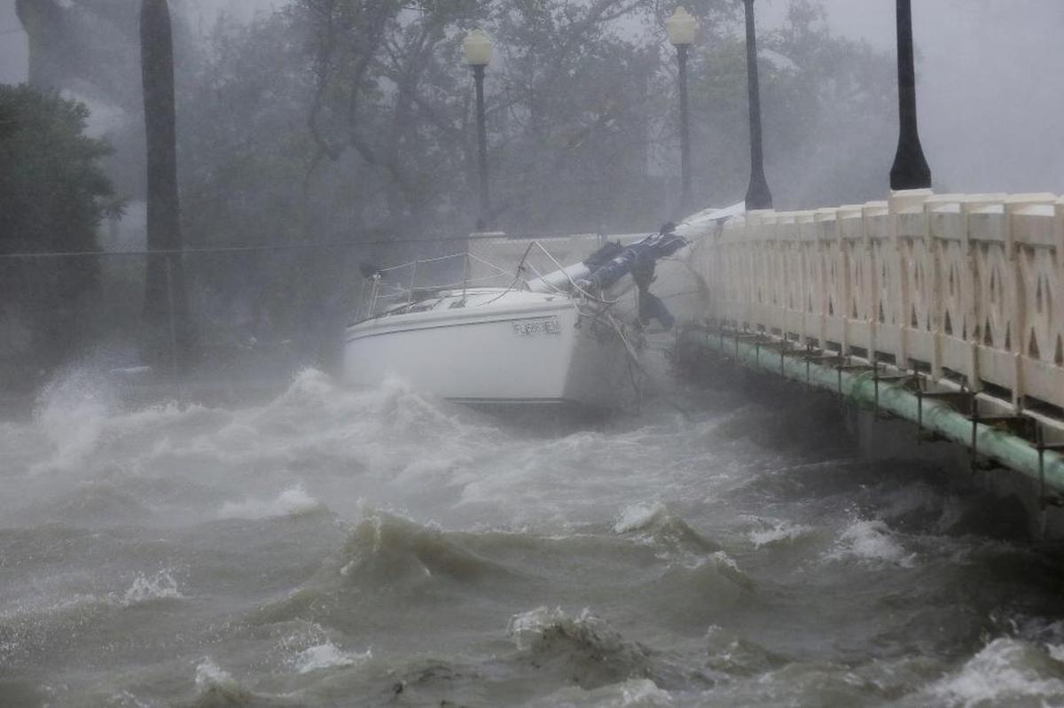 A sailboat crashes into a bridge on the Venetian Causeway due to Hurricane Irma on Sept. 10.