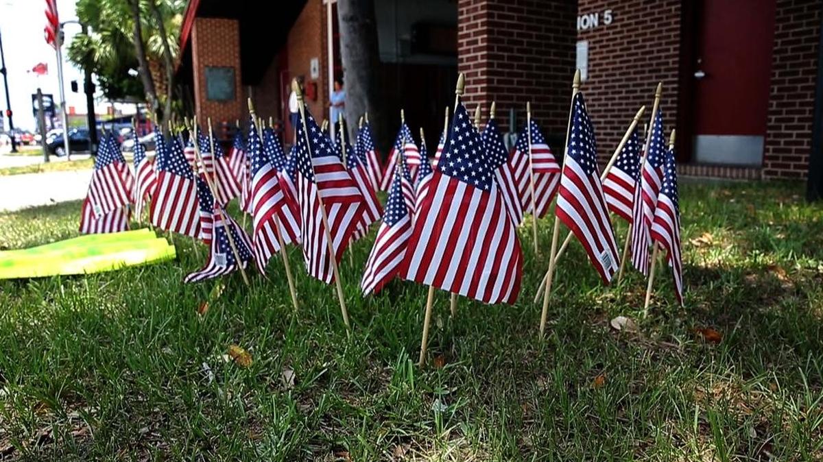 Forty-nine American flags were set up in front of Station 5 as a tribute to those who died less than a block away.