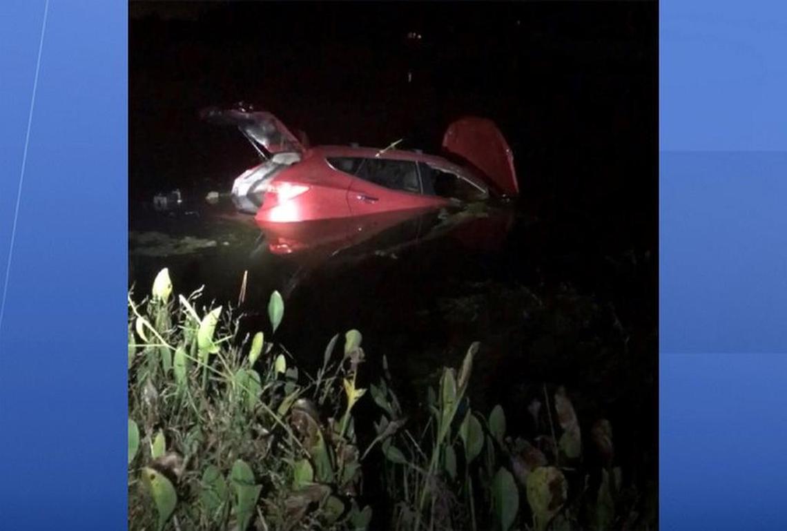 Miami-Dade Fire Rescue says you need to try and lower your windows first if your car plunges into water. File photo.