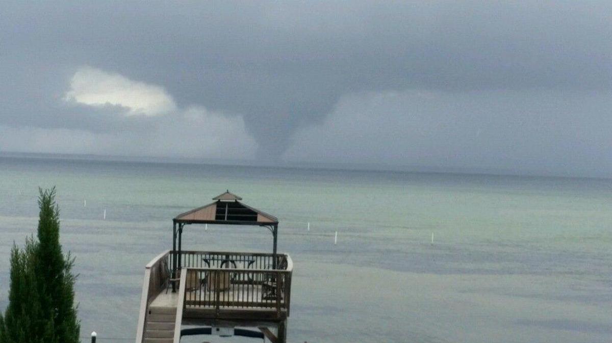 A photo of a waterspout, taken by Mark Hinds and sent to Panama City meteorologist Chris Smith, hit near Destin Wednesday morning.