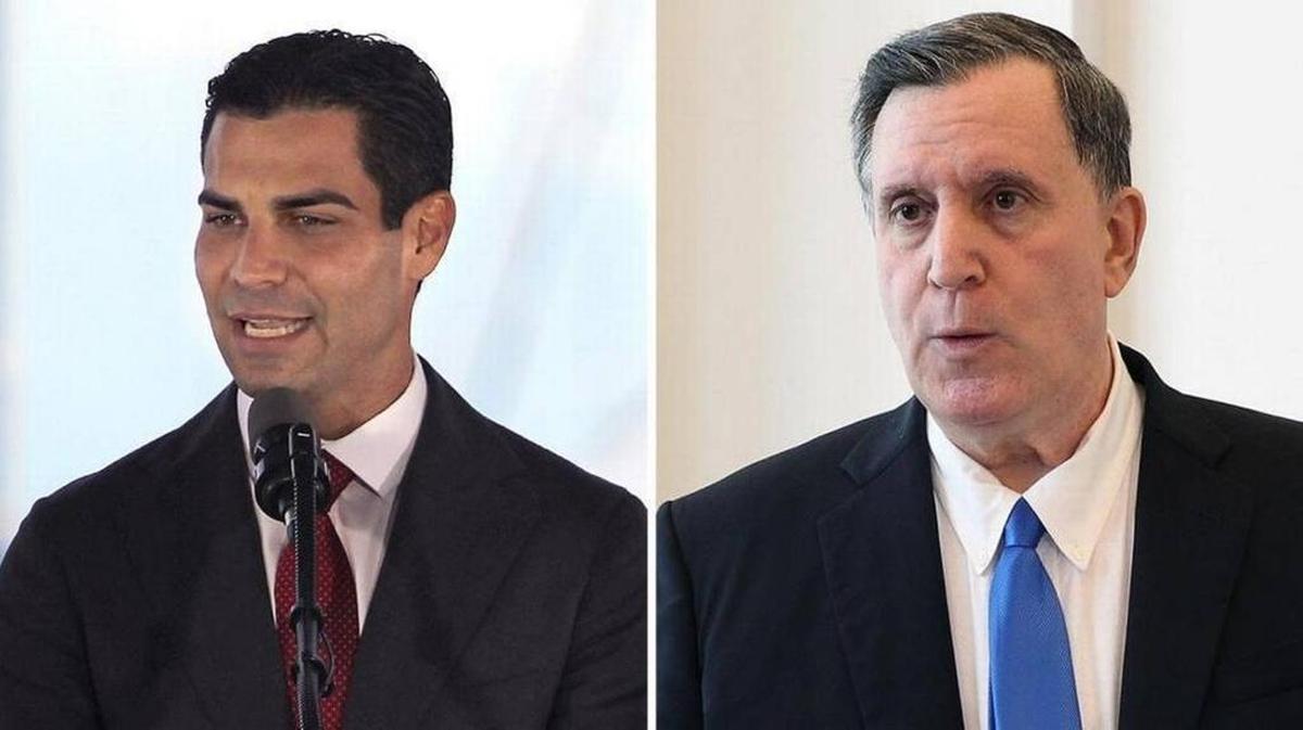 Miami Mayor Francis Suarez (left) and Commissioner Joe Carollo (right) both campaigned on promises to end Miami’s red light camera program. Both sponsored resolutions Thursday to take down the city’s traffic cameras.