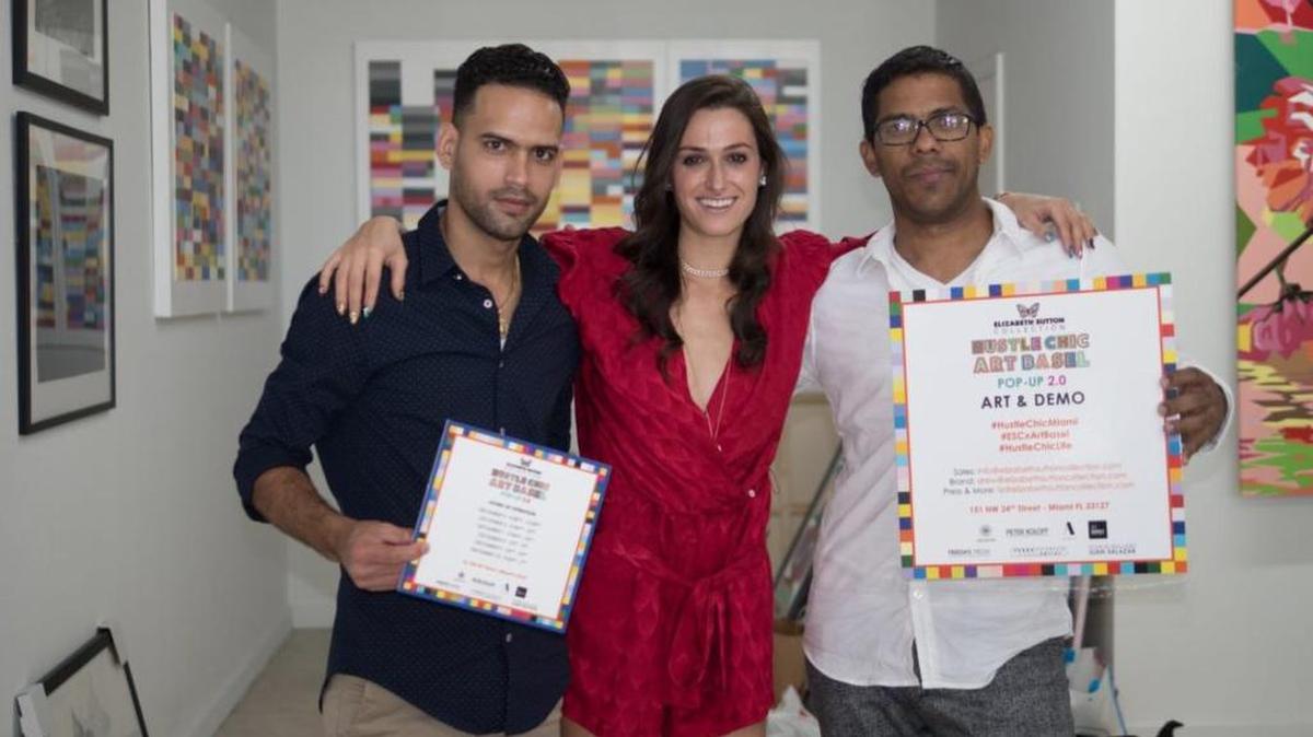Elizabeth Sutton (middle) poses with Juan Salazar Salas (left) and Pedro Valerino (right) before their Miami Art Week event. Salas and Valerino were rear-ended by another car in an accident on I-95 during Art Basel. Salas was thrown from the car and died. Valerino is in critical condition. Sutton has created a GoFundMe page to help their families.