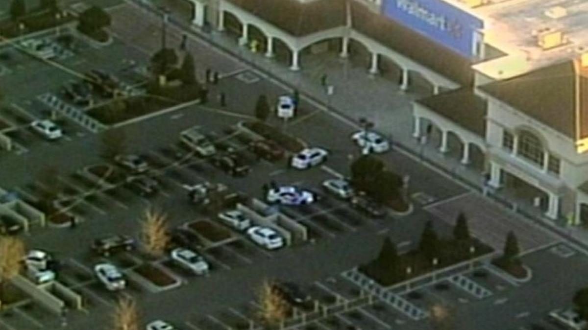 Numerous law enforcement officers respond to the Wal-Mart on West Princeton Street on Monday morning, Jan. 9, 2017, where an Orlando police officer was shot.