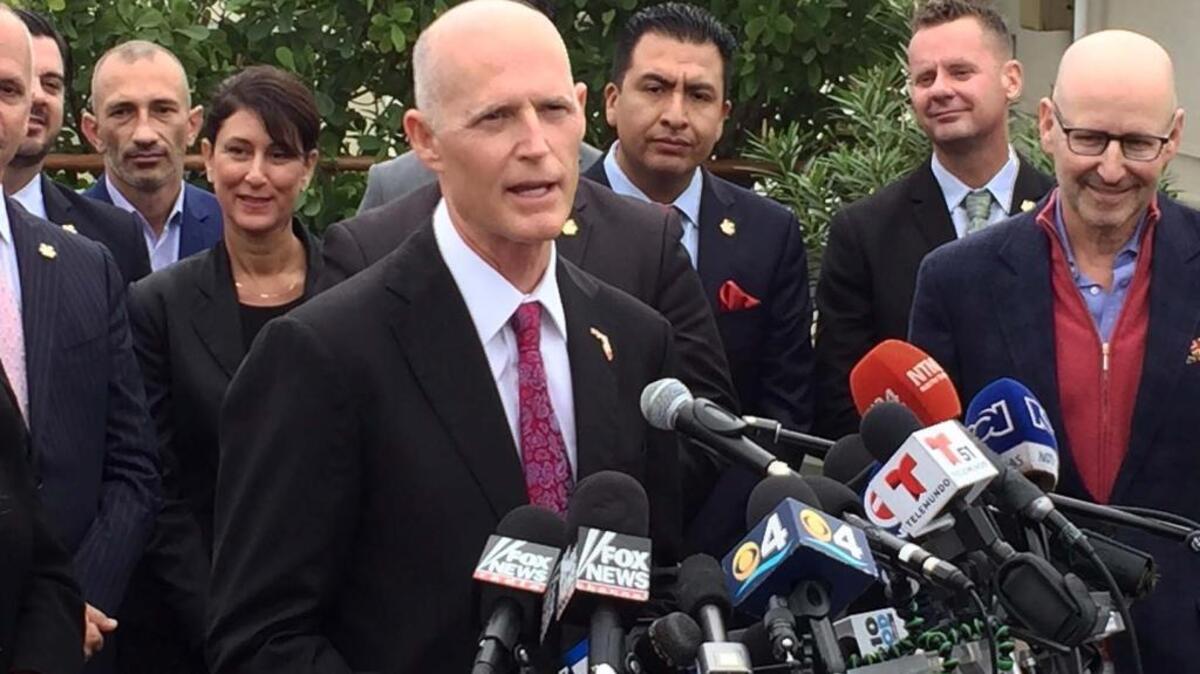 Florida Gov. Rick Scott announces the lifting of the Zika transmission zone in Miami Beach on Friday, December 9, 2016.