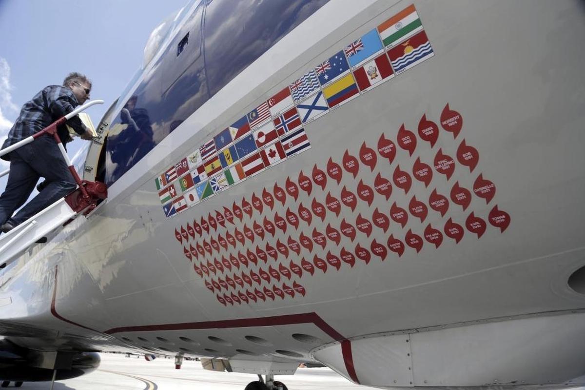 Stickers with the names of all the tropical storms and hurricanes it has flown into decorate the National Oceanic and Atmospheric Administration’s hurricane hunter plane nicknamed Kermit.