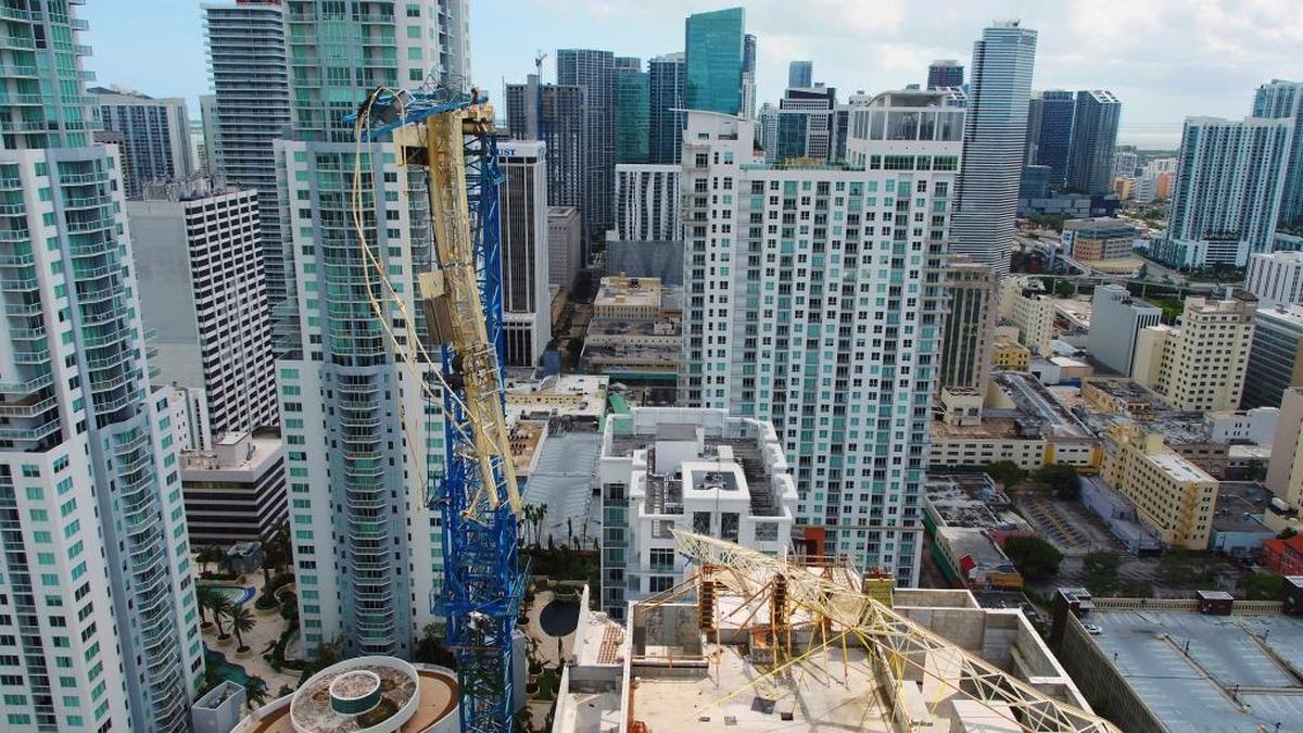 Condo development is booming in Miami. Hurricane Irma damaged this crane in a bay-front area filled with hotels and high-rise condo and office buildings, near the AmericanAirlines Arena, where the NBA's Miami Heat play.