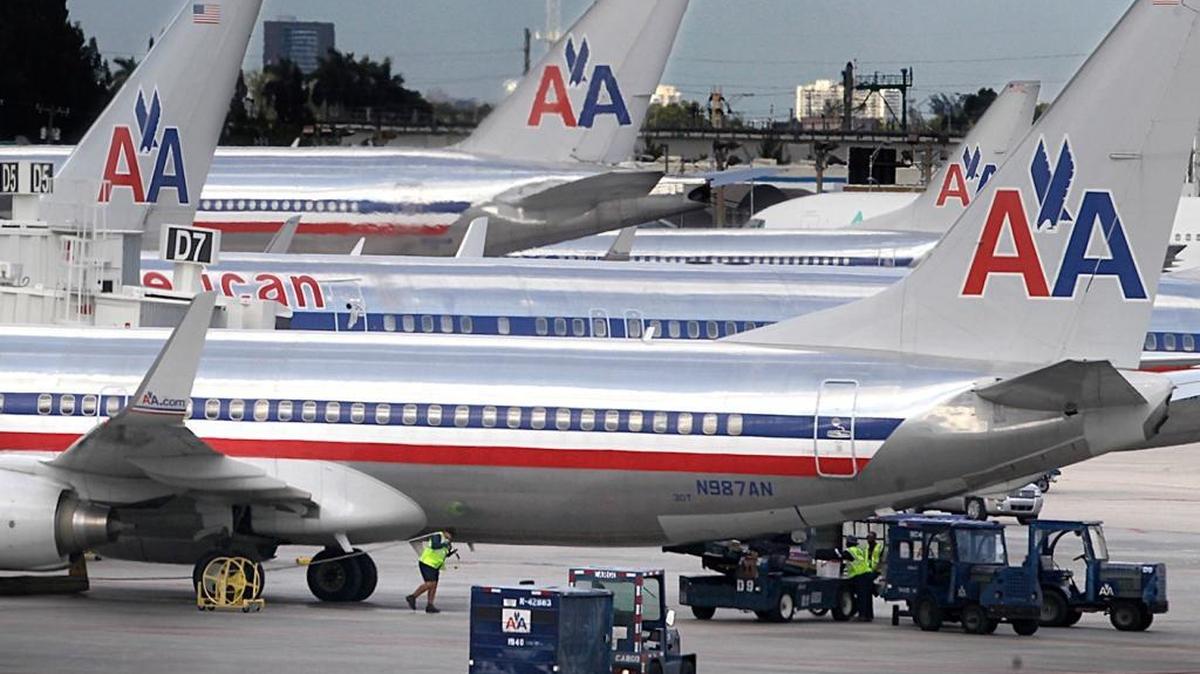 American Airlines planes parked at Miami International Airport.