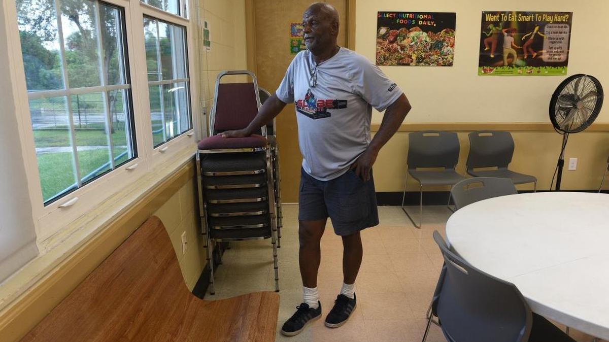 Morris Goff looks through the hurricane-proof windows Sunday at the Rubonia Community Center as Hurricane Irma approaches West Bradenton. Goff volunteered to man the building as a temporary shelter for nearby residents.