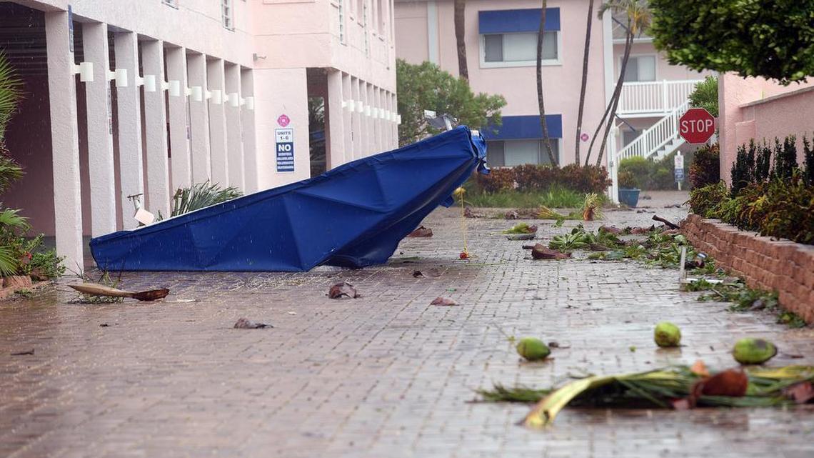 A condo’s awning lies in the driveway on Anna Maria Island Monday morning in the aftermath of Hurricane Irma.