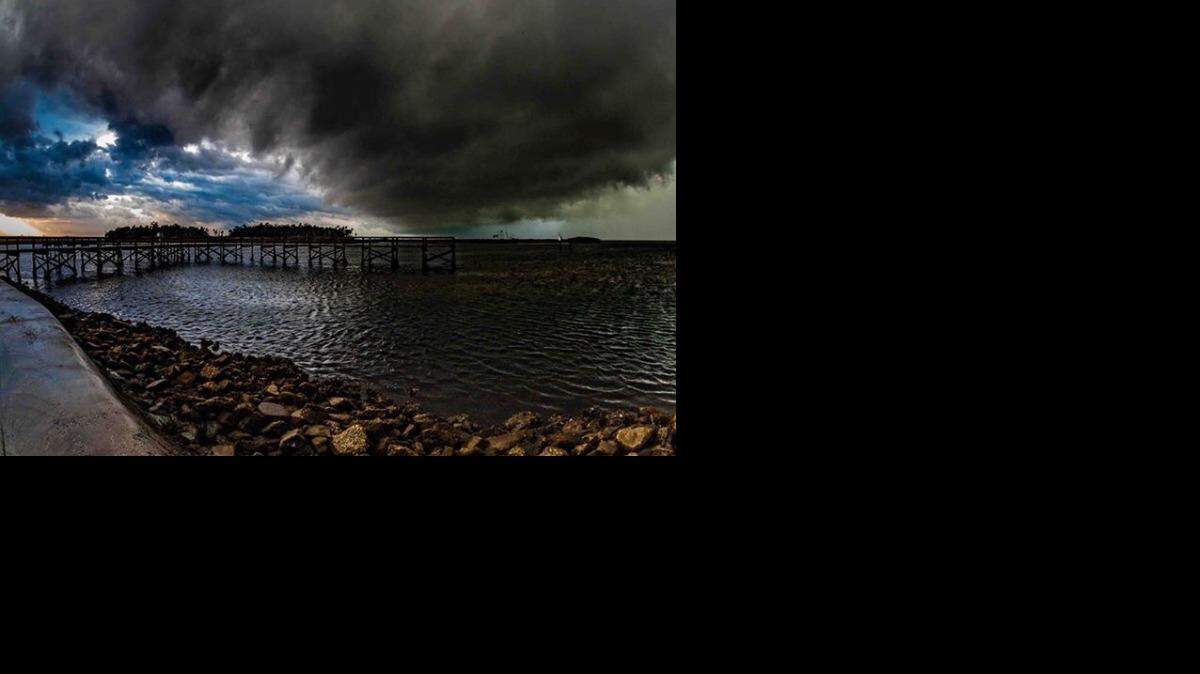 Dark clouds roll in near the Bayport Fishing Pier. (Photo: Bob Lamarre, via the Bay News 9+ app)