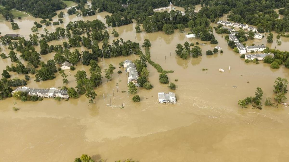 Floodwaters from the San Jacinto River inundate condominiums in the aftermath of Tropical Storm Harvey on Aug. 30, 2017, in Kingwood.