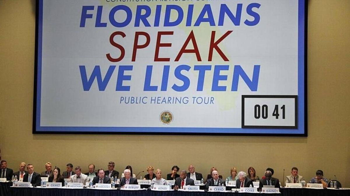 Members of the Constitutional Revision Commission listen to residents during a town hall meeting at Florida International University in Miami, April 6, 2017.
