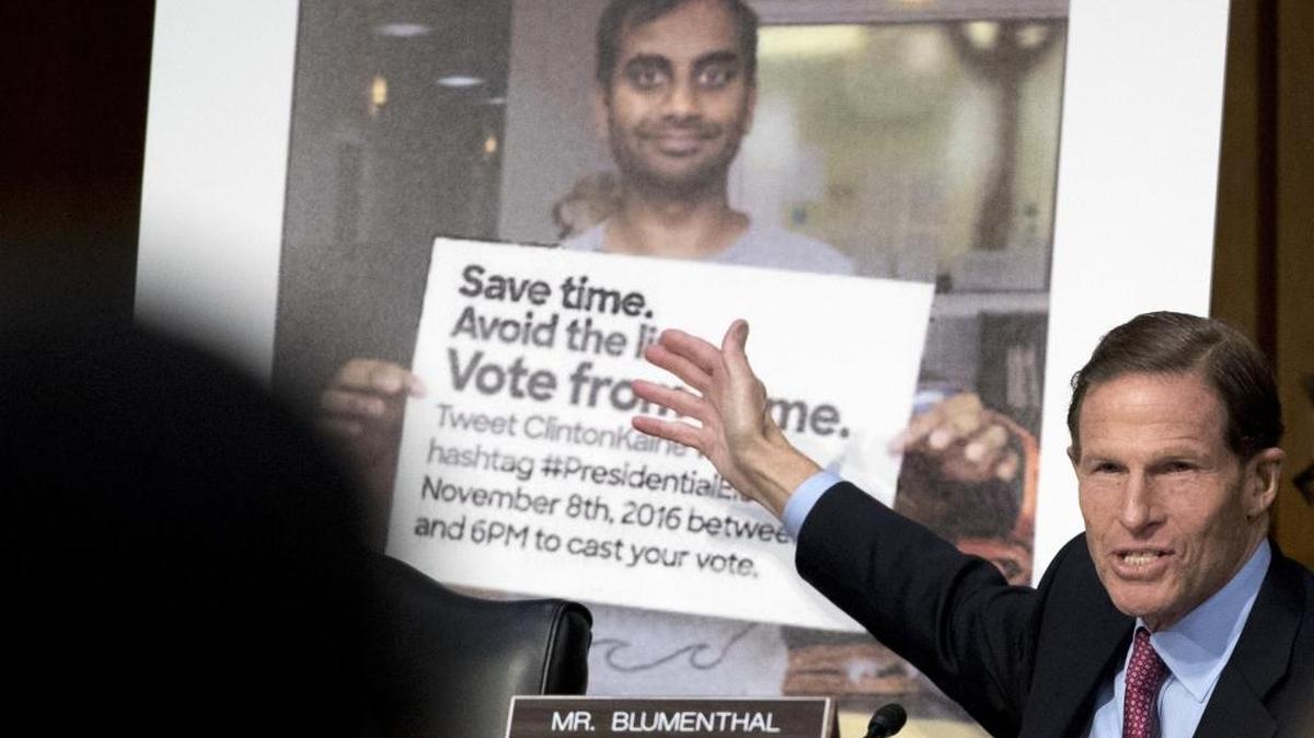 In this Oct. 31, 2017, file photo, Sen. Richard Blumenthal, D-Conn., speaks next to a poster depicting an online ad that attempted to suppress voters as Facebook’s General Counsel Colin Stretch, Twitter’s Acting General Counsel Sean Edgett, and Google’s Law Enforcement and Information Security Director Richard Salgado, testify before a Senate Committee on the Judiciary, Subcommittee on Crime and Terrorism hearing on Capitol Hill in Washington. The Feb. 16, 2018, election-interference indictment by U.S. special counsel Robert Mueller underscores how thoroughly U.S. social-media companies like Facebook and Twitter were played by Russian propagandists.