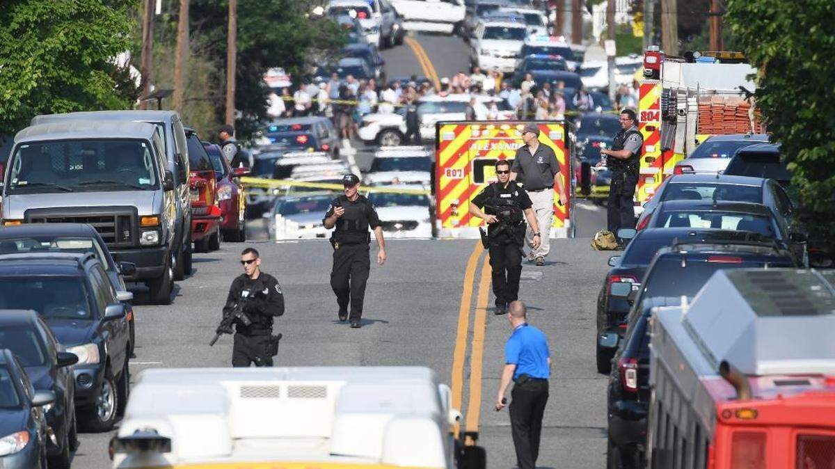 Police near the shooting Wednesday in Alexandria, Va.