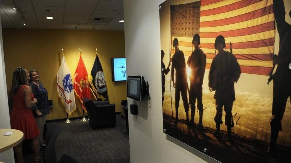 In this May 2016 file photo, visitors welcome the opening of the USF Sarasota-Manatee Military and Veterans Success Center. The center enables USFSM student veterans to explore benefits and scholarship programs while providing a place for counseling and meetings, or simply to socialize.