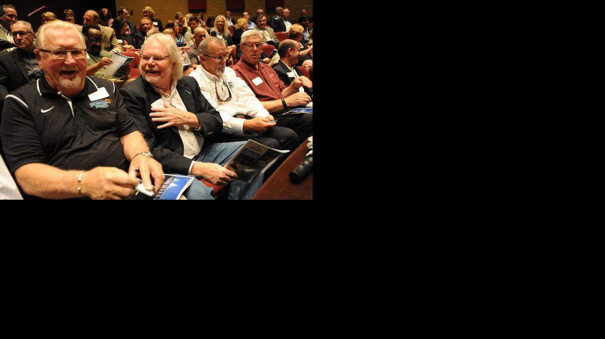 Bradenton Mayor Wayne Poston, left, and Rick Fawley gather with fellow community leaders during the Build Bradenton Area Plan launch event last Friday at the Manatee Performing Arts Center.