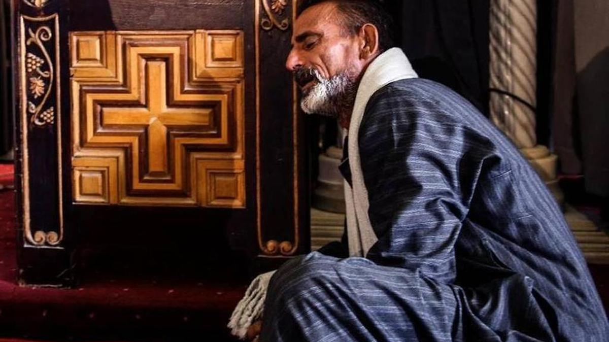 A man cries at the funeral of victims killed in a suicide attack against the Copts on Palm Sunday in Egypt.