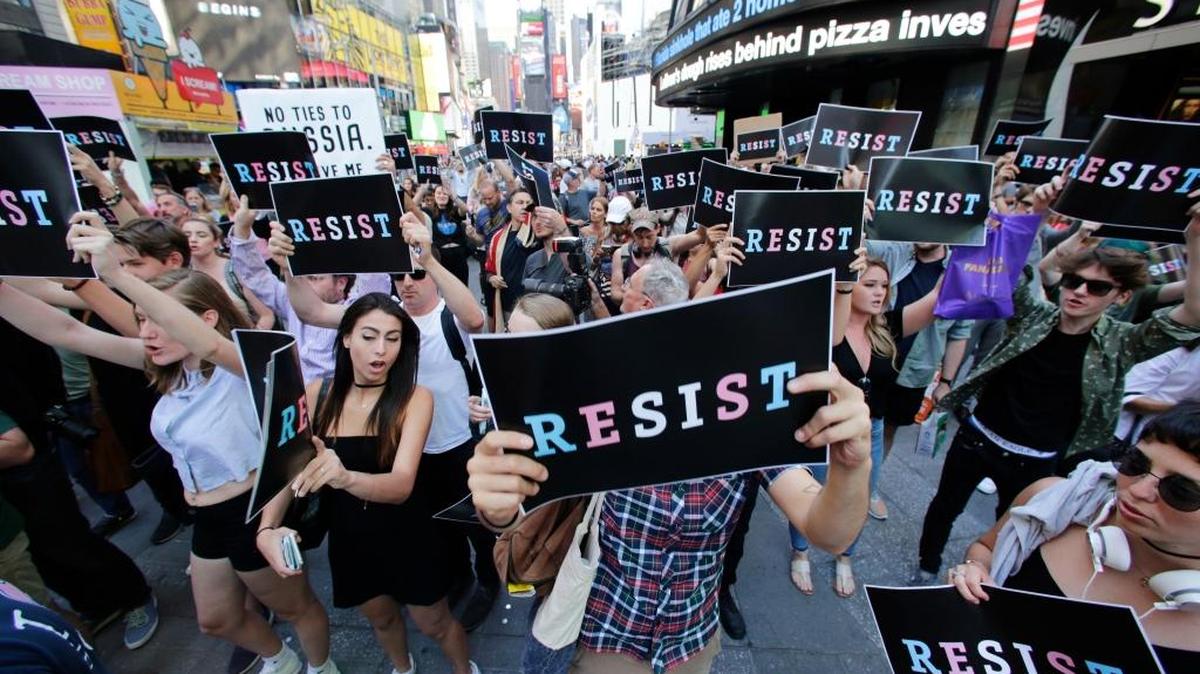 Protestors gather Wednesday in Times Square in New York after President Trump declared a ban on transgender troops serving anywhere in the U.S. military.