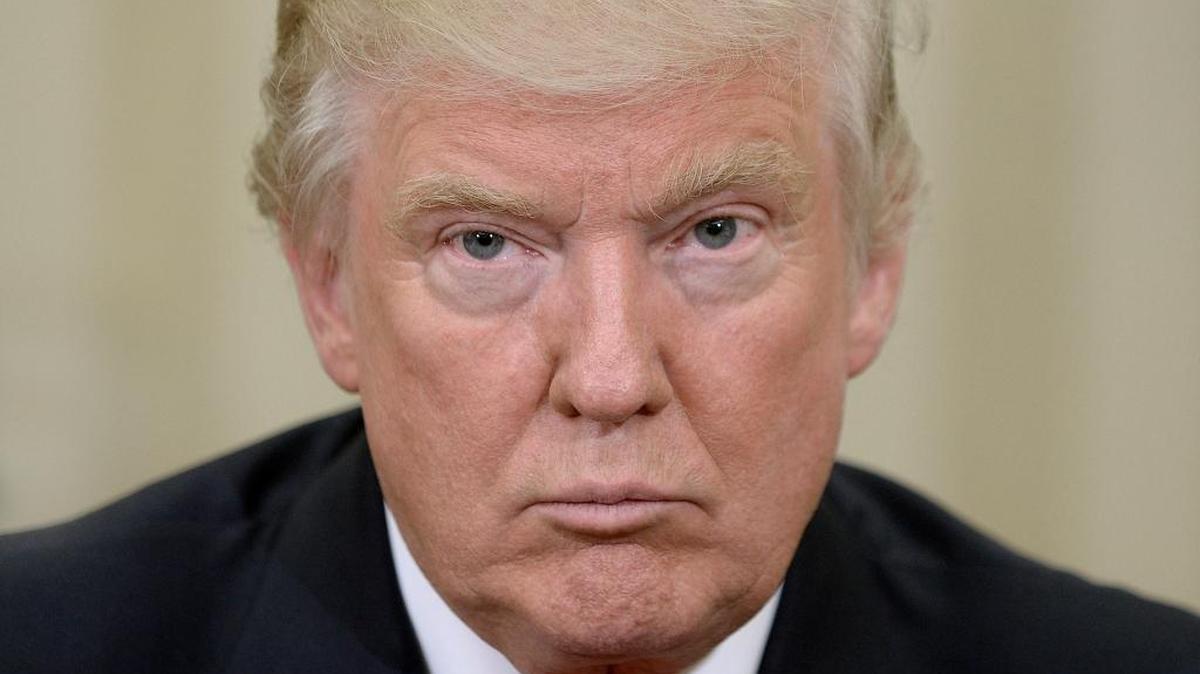 President-elect Donald Trump looks on in the Oval Office of the White House on Thursday, Nov. 10, 2016 during a meeting with U.S. President Barack Obama in their first public step toward a transition of power in Washington, D.C.