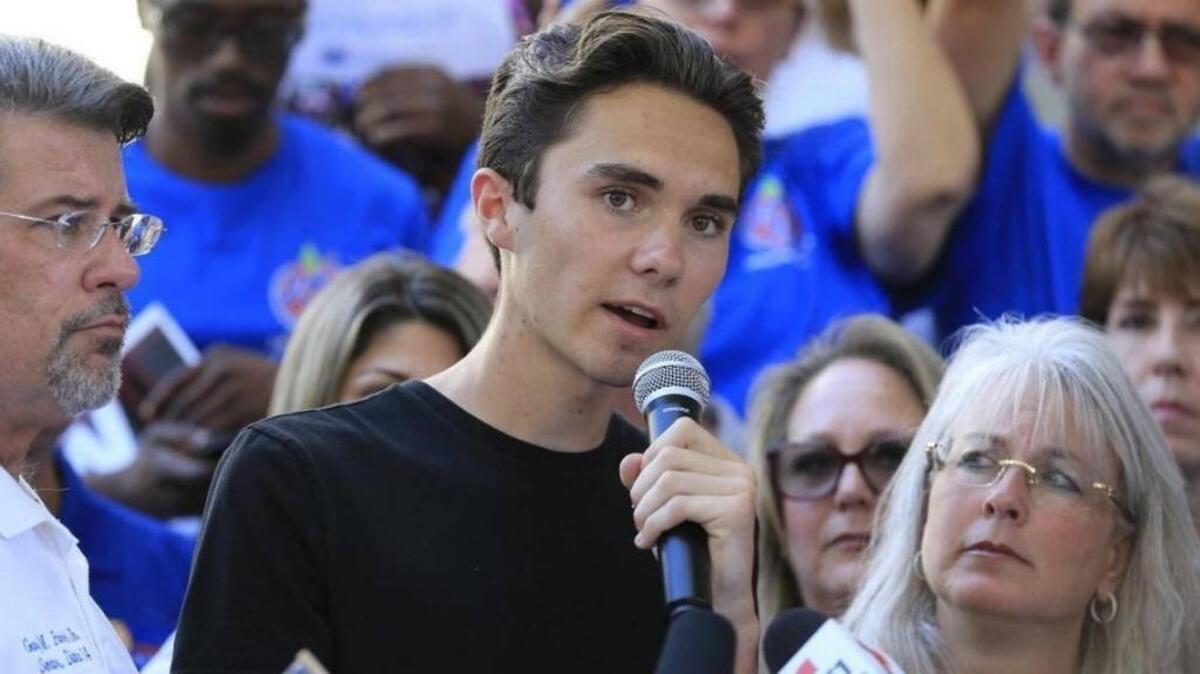 FILE: David Hogg, a student in the debate program at Marjory Stoneman Douglas High School, speaks in support of gun control at the Federal Building-United States Courthouse in Fort Lauderdale on Saturday, Feb. 17, 2018.