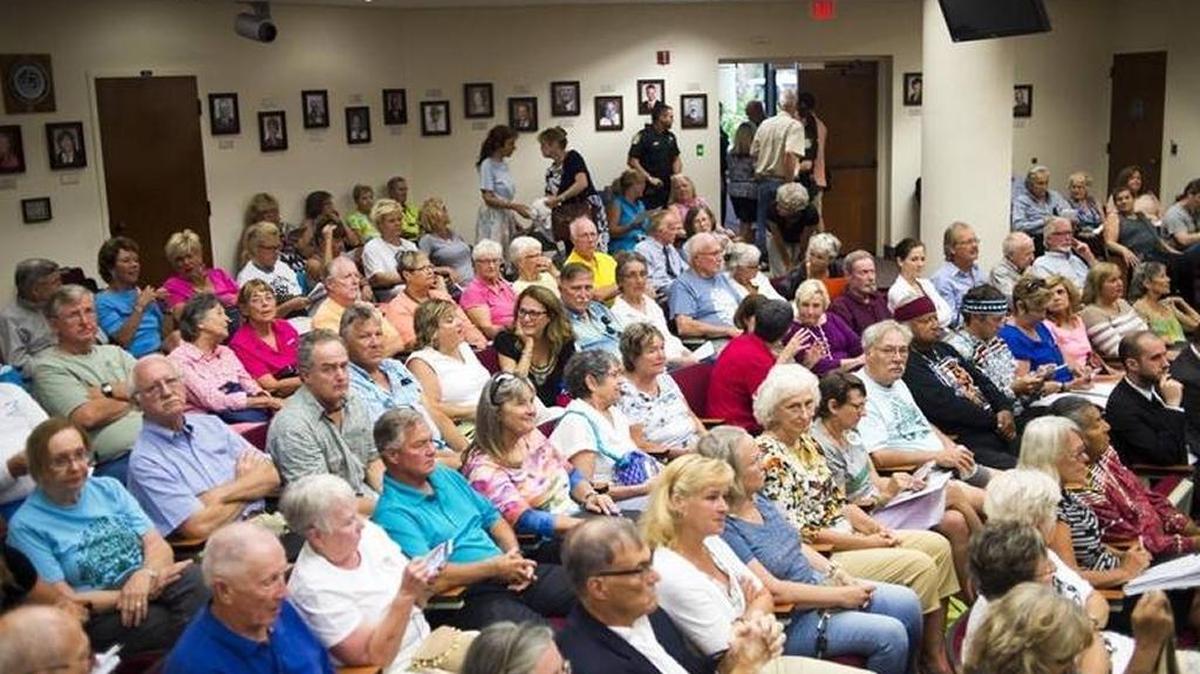FILE: The Manatee County Commissioners Chamber was packed May 4 with residents as the Manatee County Commission met to consider a permit for Aqua by the Bay, Carlos Beruff's development.