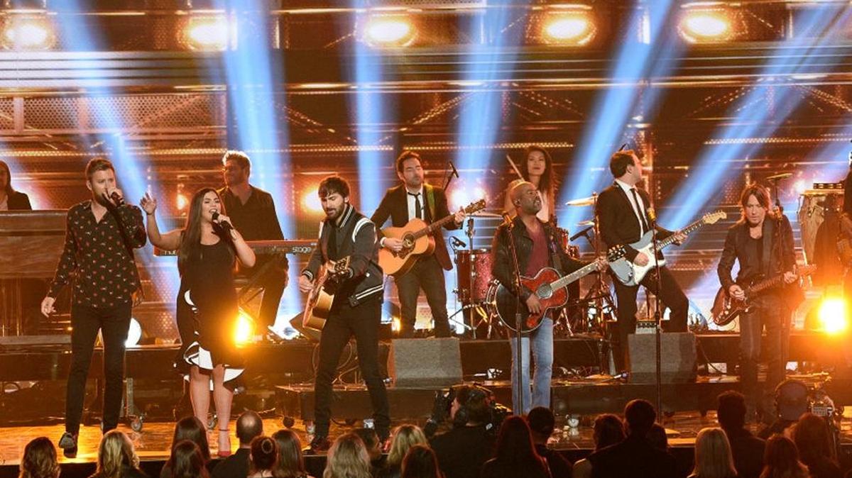 Charles Kelley, from left, Hillary Scott, Dave Haywood, Darius Rucker and Keith Urban perform a medley at the 51st annual CMA Awards at the Bridgestone Arena on Wednesday in Nashville.