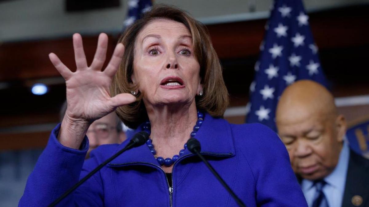 House Minority Leader Nancy Pelosi of Calif., joined at right by Rep. Elijah Cummings, D-Md., ranking member of the House Oversight and Government Reform Committee, speaks during a news conference on Capitol Hill in Washington, Tuesday, Feb. 14, 2017, calling for an investigation into President Donald Trump's relationship with Russia, including when Trump learned that his national security adviser, Michael Flynn, had discussed U.S. sanctions with a Russian diplomat.