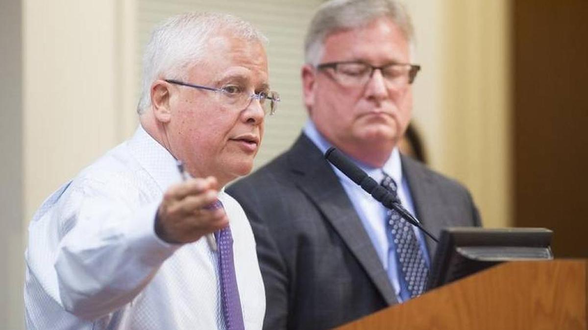 In this May 4, 2017, file photo, Carlos Beruff talks about sea walls in the proposed development with his attorney, Ed Vogler, right, as the Manatee County Commission met to consider a permit for Aqua by the Bay, Carlos Beruff's development.