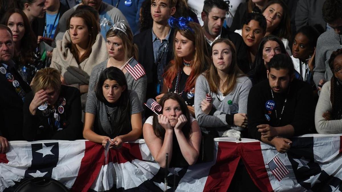 Hillary Clinton supporters watch results roll in from the states on election night at the Javits Center on Tuesday in New York.