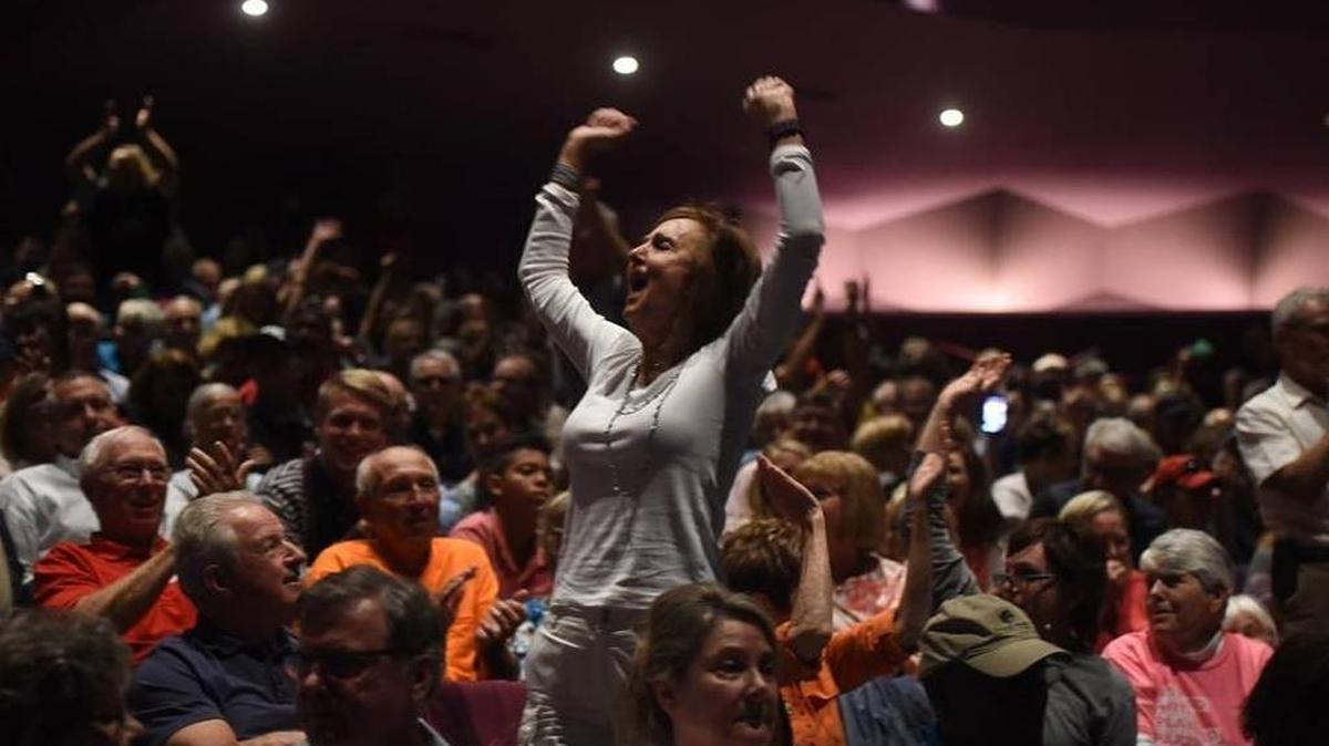 FILE PHOTO: It was a loud and boisterous crowd at Vern Buchanan’s town hall March 18 at the Van Wezel in Sarasota.