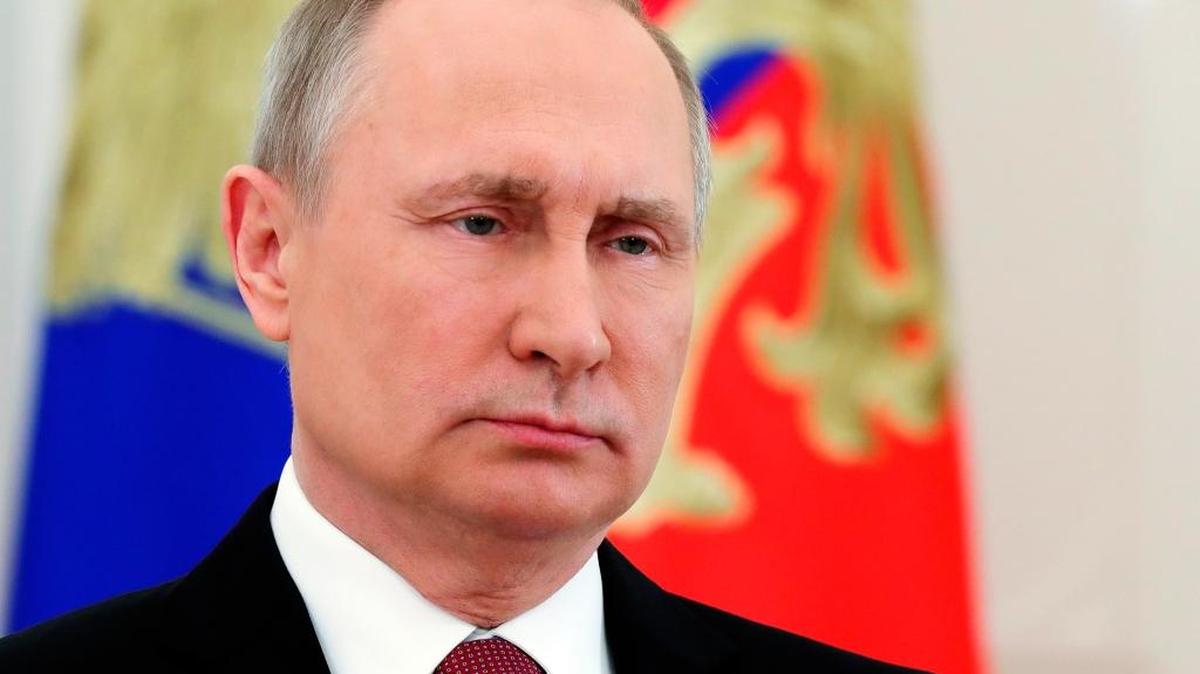 Russian President Vladimir Putin speaks during a live televised speech in Moscow, Russia, Friday, March 23, 2018.