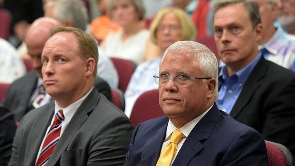 FILE: Pete Logan and developer Carlos Beruff sit on Oct. 3, 2017, as Aqua by the Bay development proposal goes before the board of county commissioners.