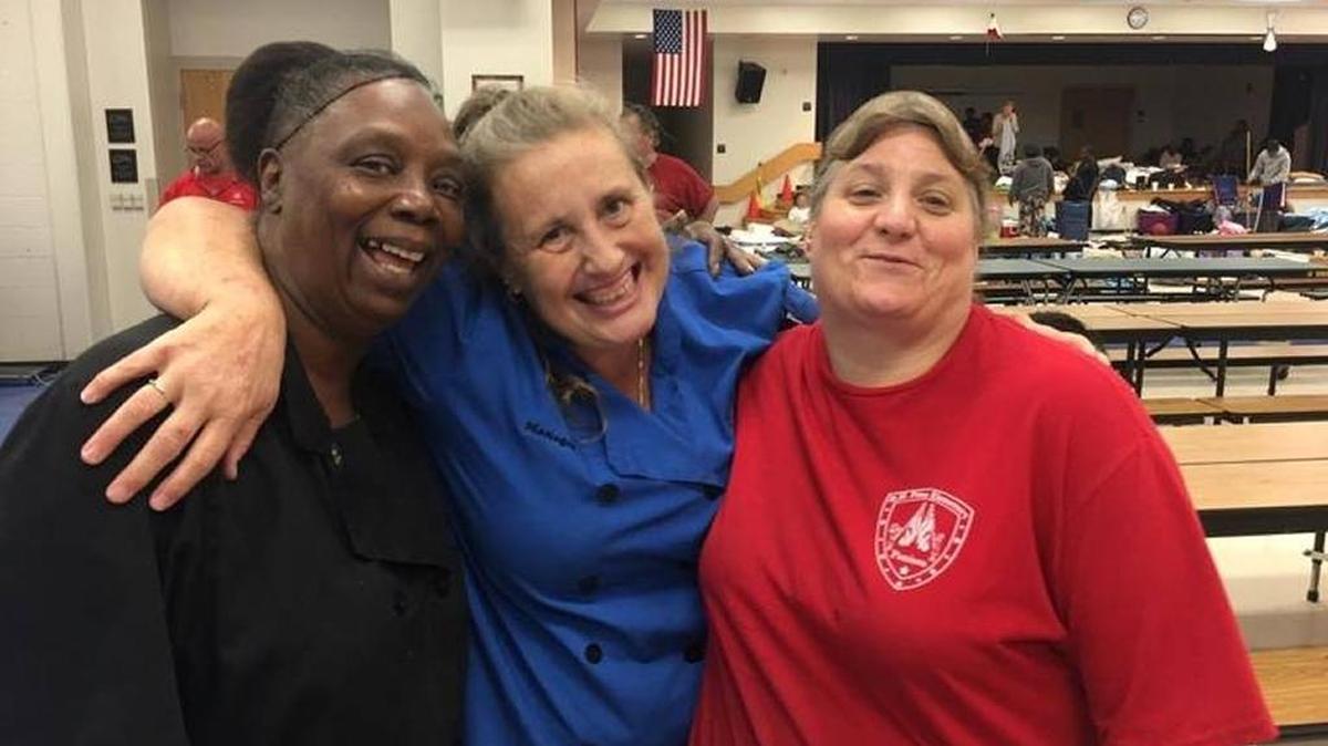 FILE PHOTO: Shelter workers clown around at Prine Elementary on Sunday.