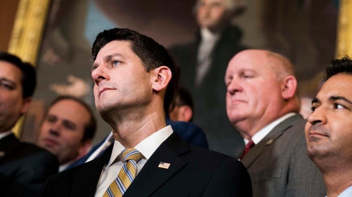 Speaker of House Paul Ryan along with his leadership and members of the House Ways and Means Committee during an event to celebrate the passage of the House tax bill on Thursday.