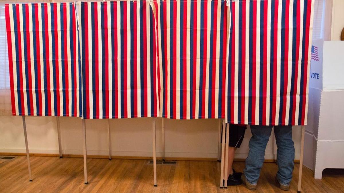 In this Nov. 8 photo, a voter fills out his ballot at the Wilson School House in unincorporated Wilson, Idaho. Donald Trump’s victory came as a surprise to many Americans, the nation’s pollsters most of all. Heading into Election Day, most national surveys led many to believe she was a shoo-in to win the Electoral College.