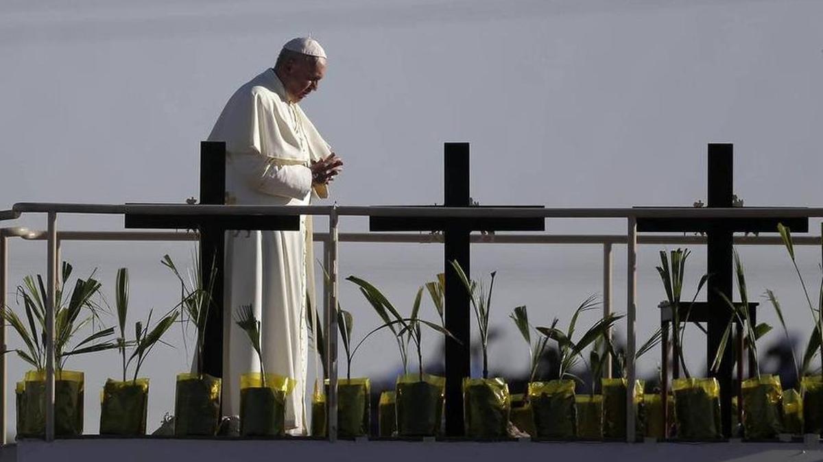 Pope Francis stands a platform near the U.S.-Mexico border fence along the Rio Grande, in Ciudad Juarez, Mexico, on Feb. 17, 2016.