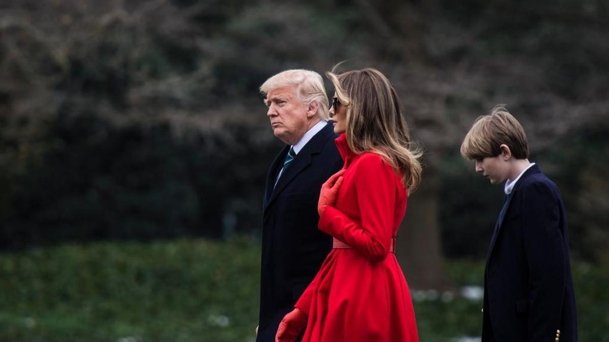 President Trump, first lady Melania Trump, and their son Barron walk to Marine One on the South Lawn of the White House on March 17, 2017.