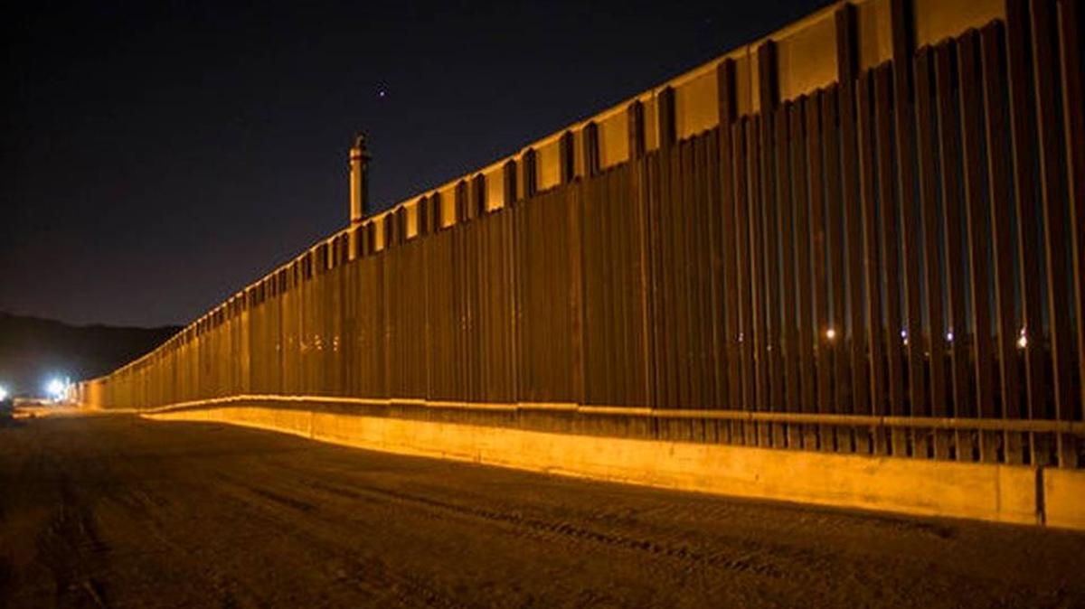 FILE - In this March 30, 2017 file photo, a portion of the new steel border fence stretches along the US-Mexico border in Sunland Park, New Mexico.