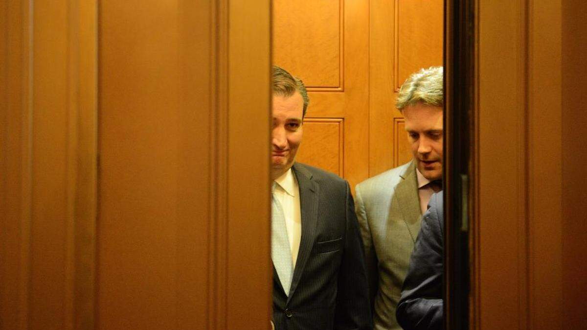 Ted Cruz leaves the Senate floor after a vote Friday. The Texas senator is one of the holdouts on the health care bill, but he's widely expected to come around.