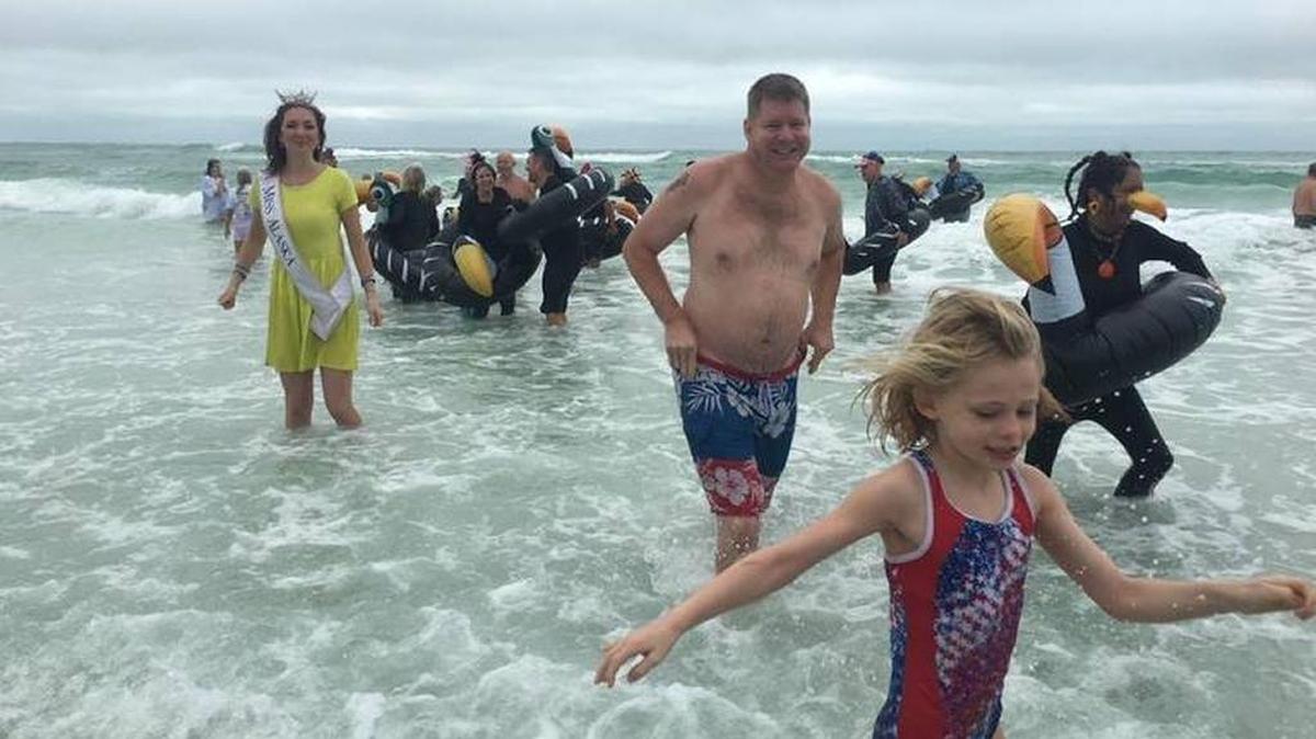 Participants in the 10th Annual Shamrock Shiver Charity Plunge