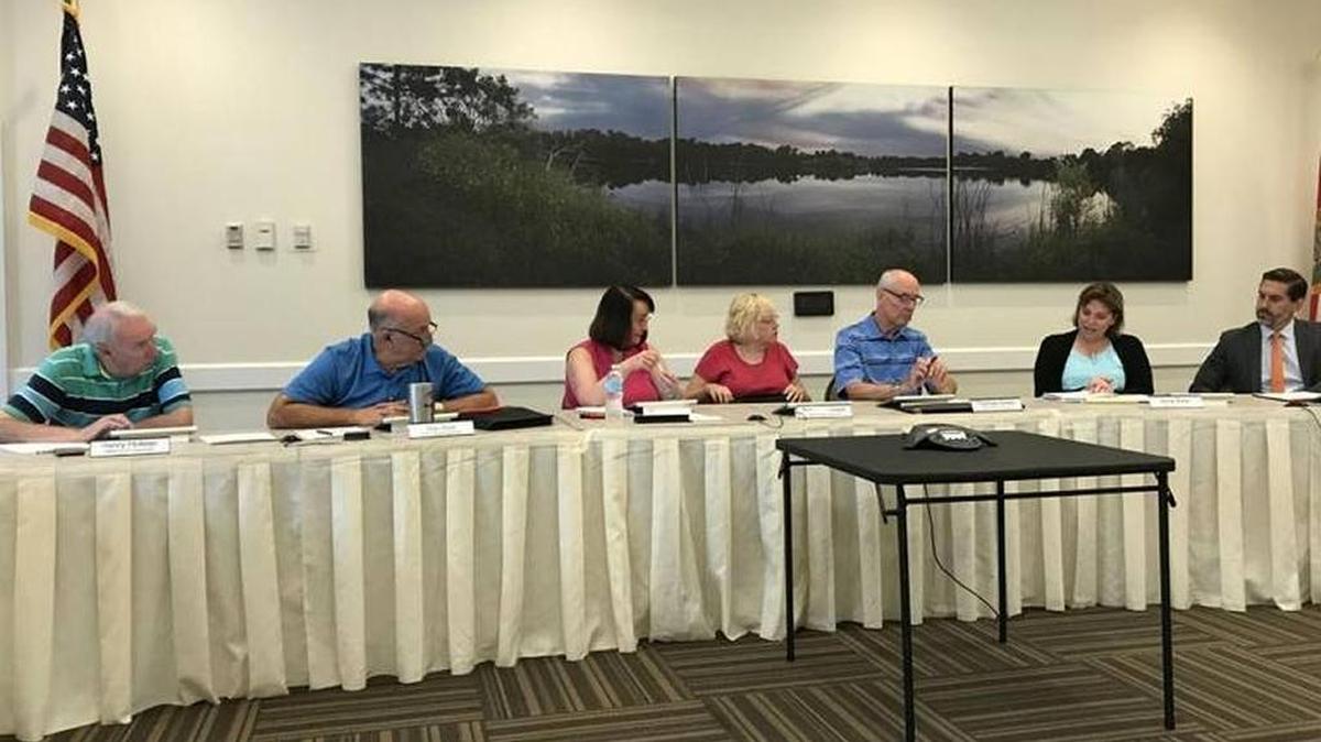 Lakewood Ranch supervisors are asking residents to cut back on their lawn watering, especially during the rainy season. Shown above are supervisors during the Inter-District Authority meeting on Tuesday, from left: Henry Hofeler, Alan Roth, Glenda Robertson, Nancy Johnson, chairman Tom Green, executive director Anne Ross and attorney Scott Rudacille.