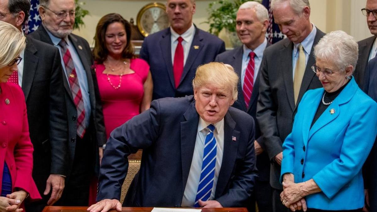 President Donald Trump arrives to sign various bills in the Roosevelt Room of the White House, Monday, March 27, 2017, in Washington.