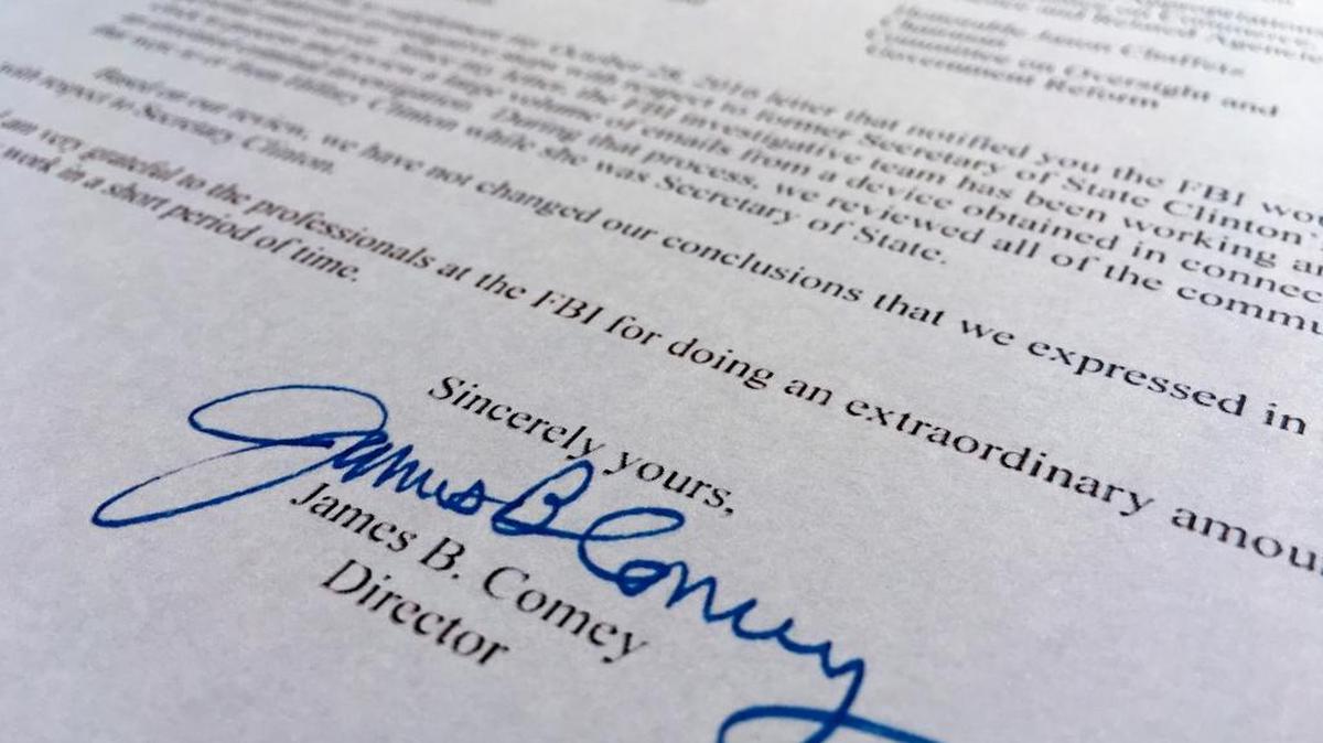 Part of a Nov. 6, 2016, letter from FBI director James Comey to Congress is photographed in Washington, Sunday, Nov. 6, 2016. Comey tells Congress that a review of new Hillary Clinton emails has "not changed our conclusions" from earlier this year that she should not face charges.