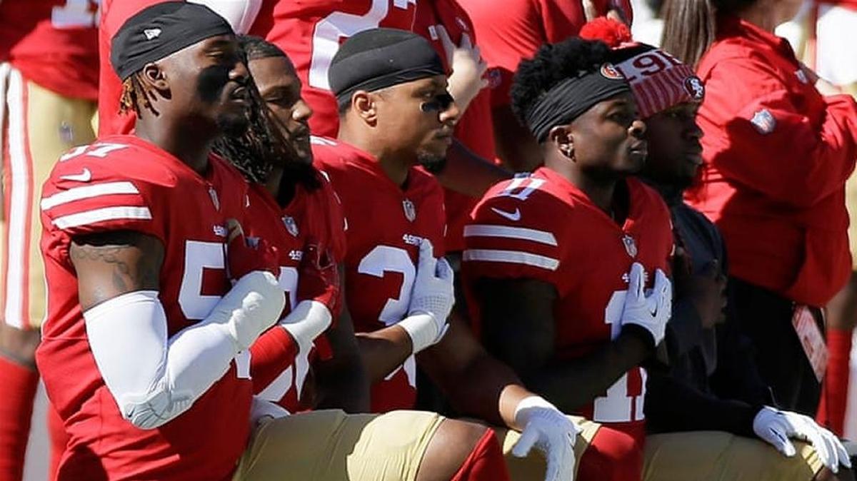 Several San Francisco 49ers players knelt during the performance of the national anthem on Sunday