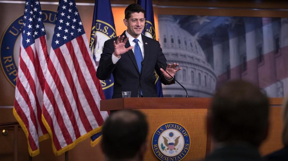 Speaker of the House Paul Ryan, R-Wis., meets with reporters Thursday as he defends the Republican tax reform legislation, on Capitol Hill in Washington.
